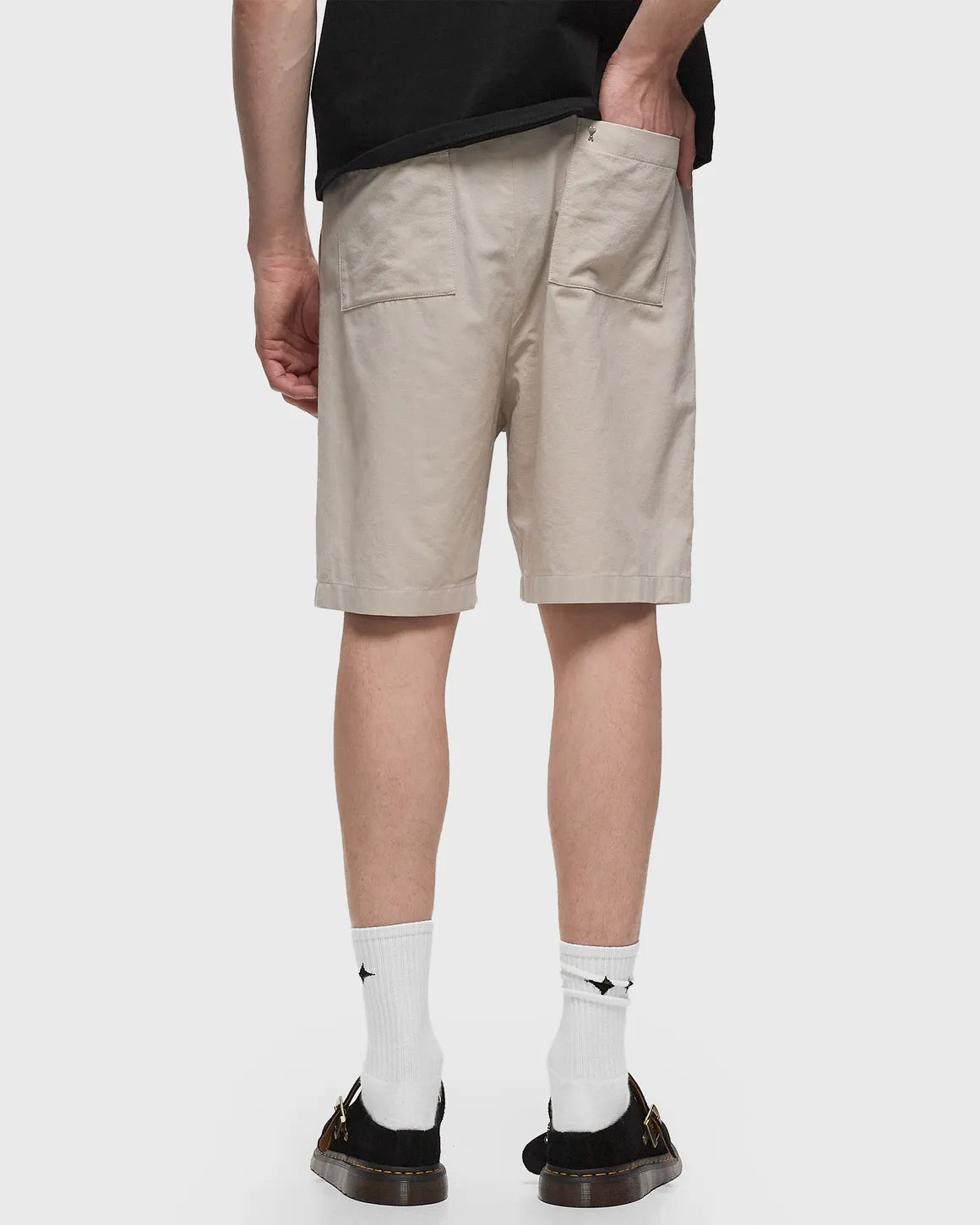 Beige shorts on a white background