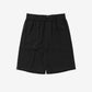 Black shorts on a light gray background