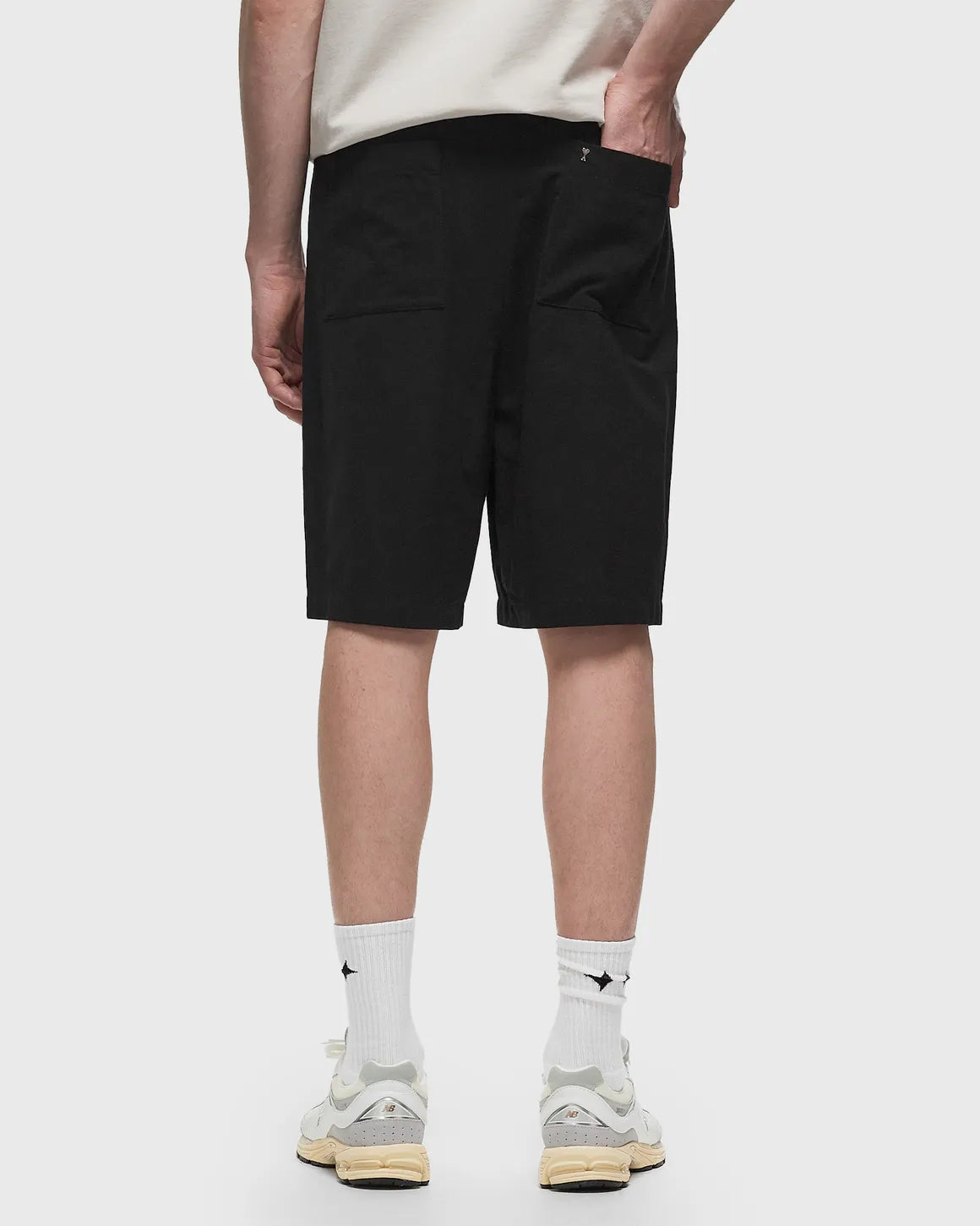 Black shorts on a light gray background