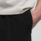 Black shorts on a light gray background