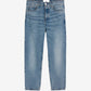 Blue jeans on a light beige background