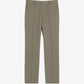 Green pants on a beige background