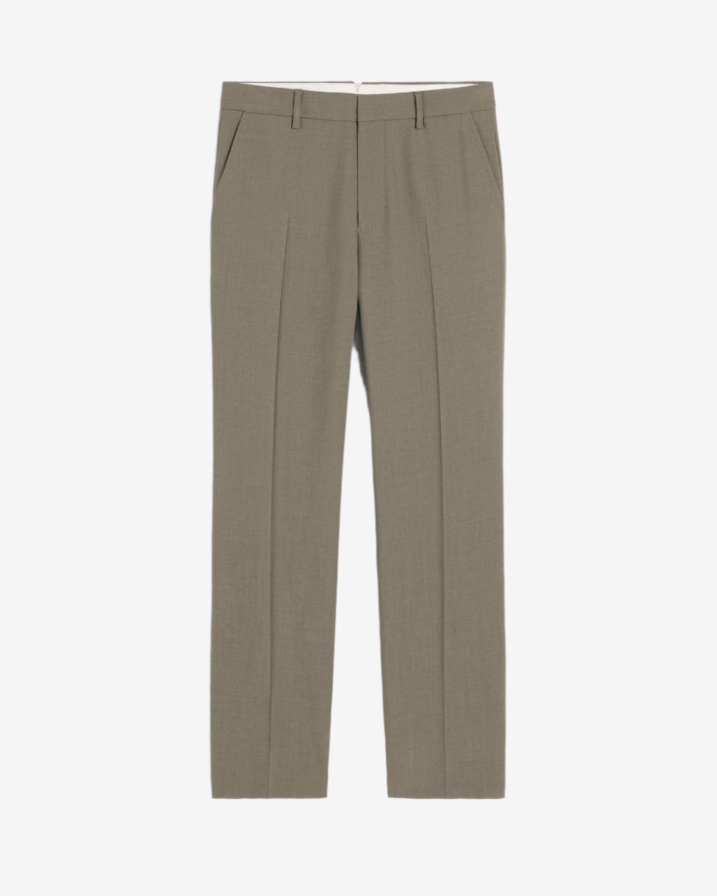 Green pants on a beige background