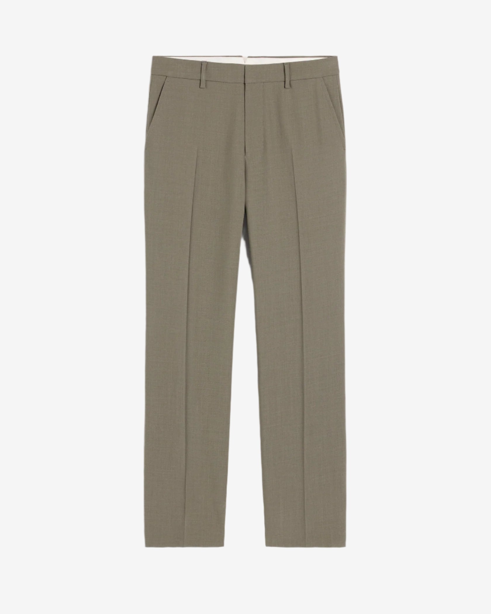 Green pants on a beige background