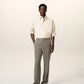 Green pants on a beige background