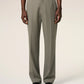 Green pants on a beige background