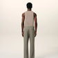 Green pants on a beige background