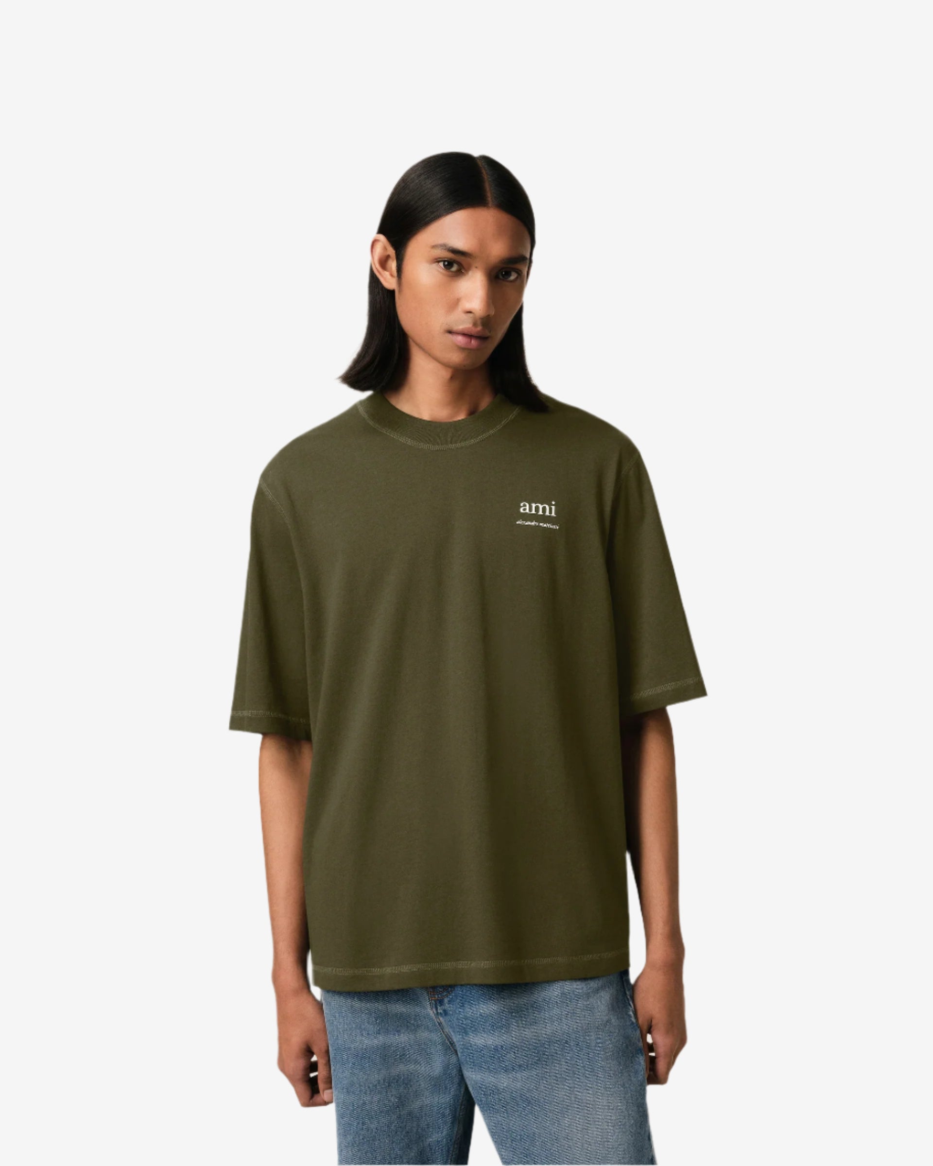 Green t-shirt with a small logo on a white background ami paris