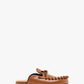 Pair of brown moccasins on a white background