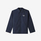 Navy blue shirt with a brand logo on a light gray background