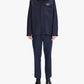 Navy blue shirt with a brand logo on a light gray background