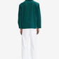 Green shirt with a brand logo on a white background