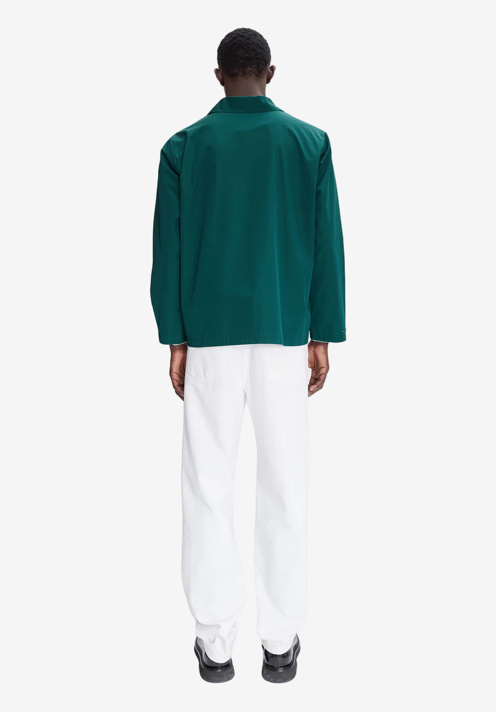 Green shirt with a brand logo on a white background