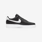 Black and white sneaker with Nike logo on a light gray background