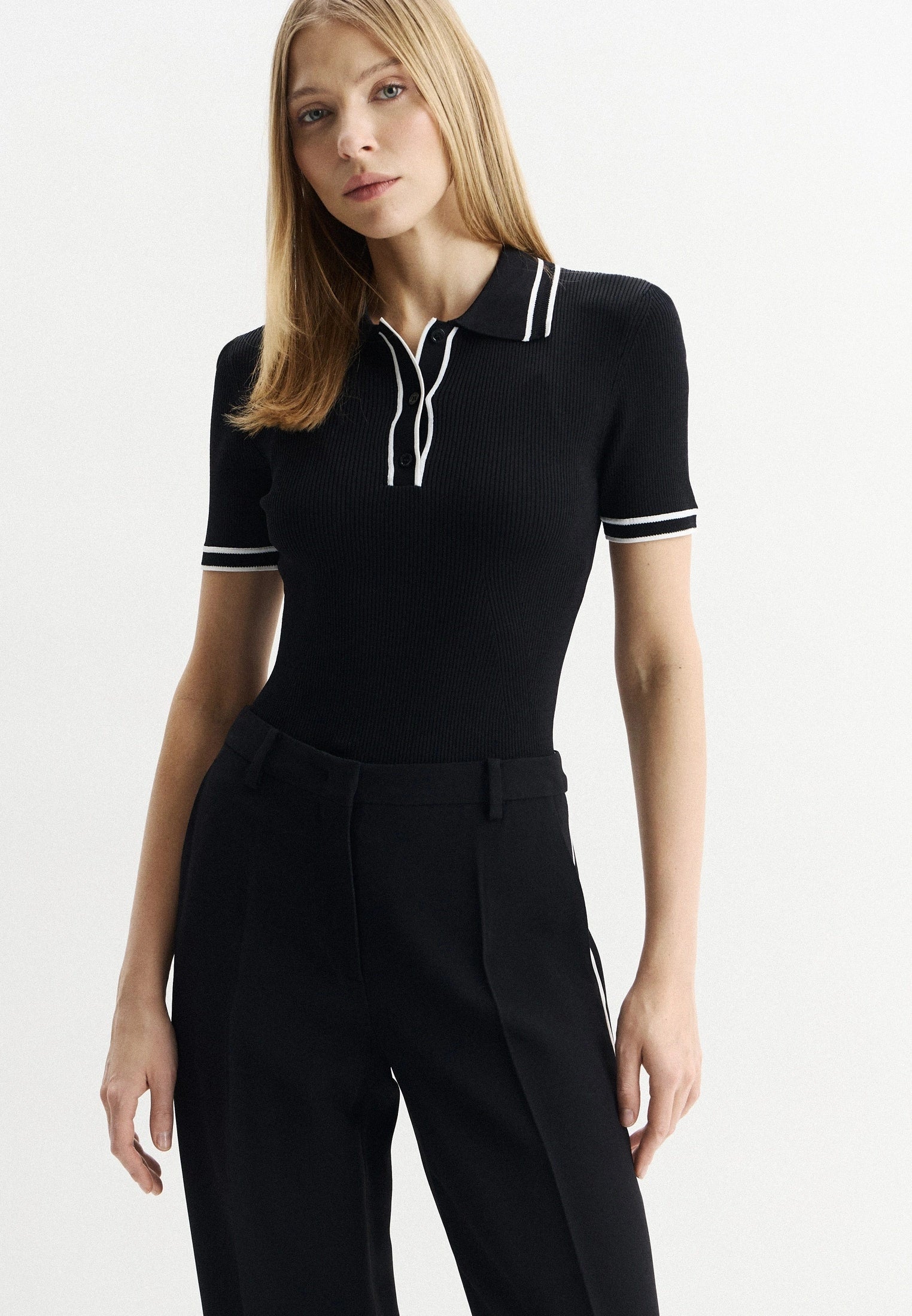 Black polo shirt in viscose blend with contrasting stripes