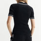 Black polo shirt in viscose blend with contrasting stripes