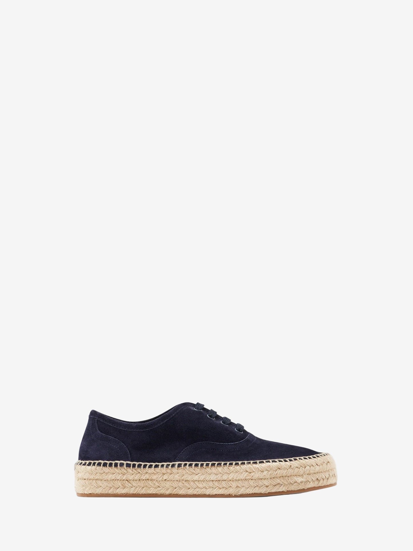 Navy blue espadrille shoe on a white background