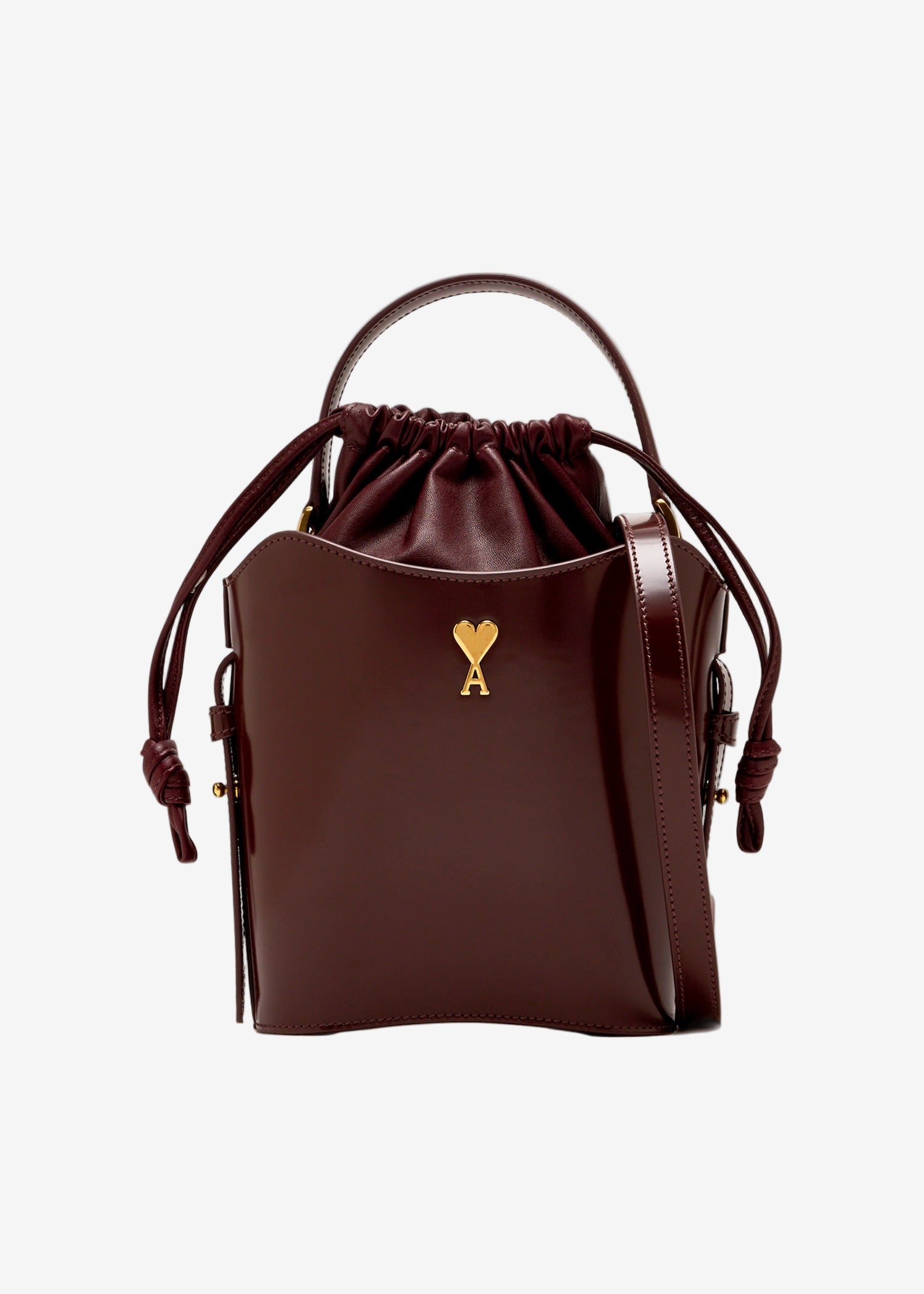 Brown leather drawstring bag with a heart-shaped logo on a white background