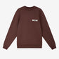Brown sweatshirt with a small logo on a white background