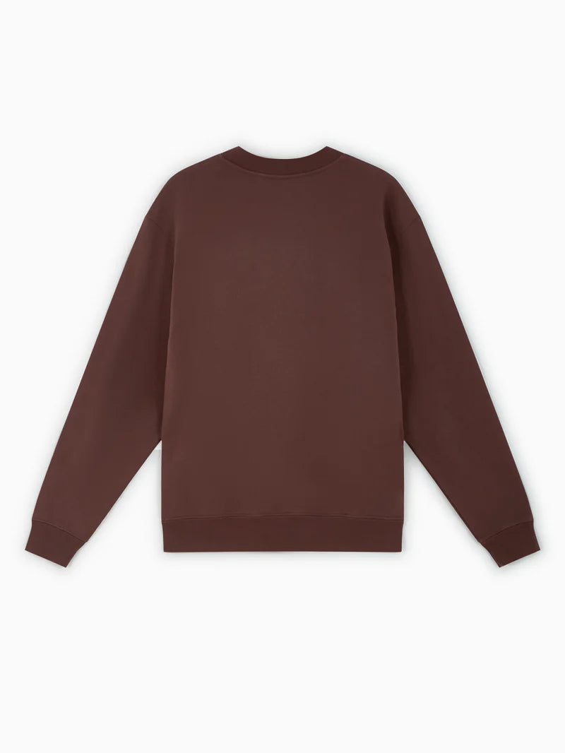 Brown sweatshirt with a small logo on a white background