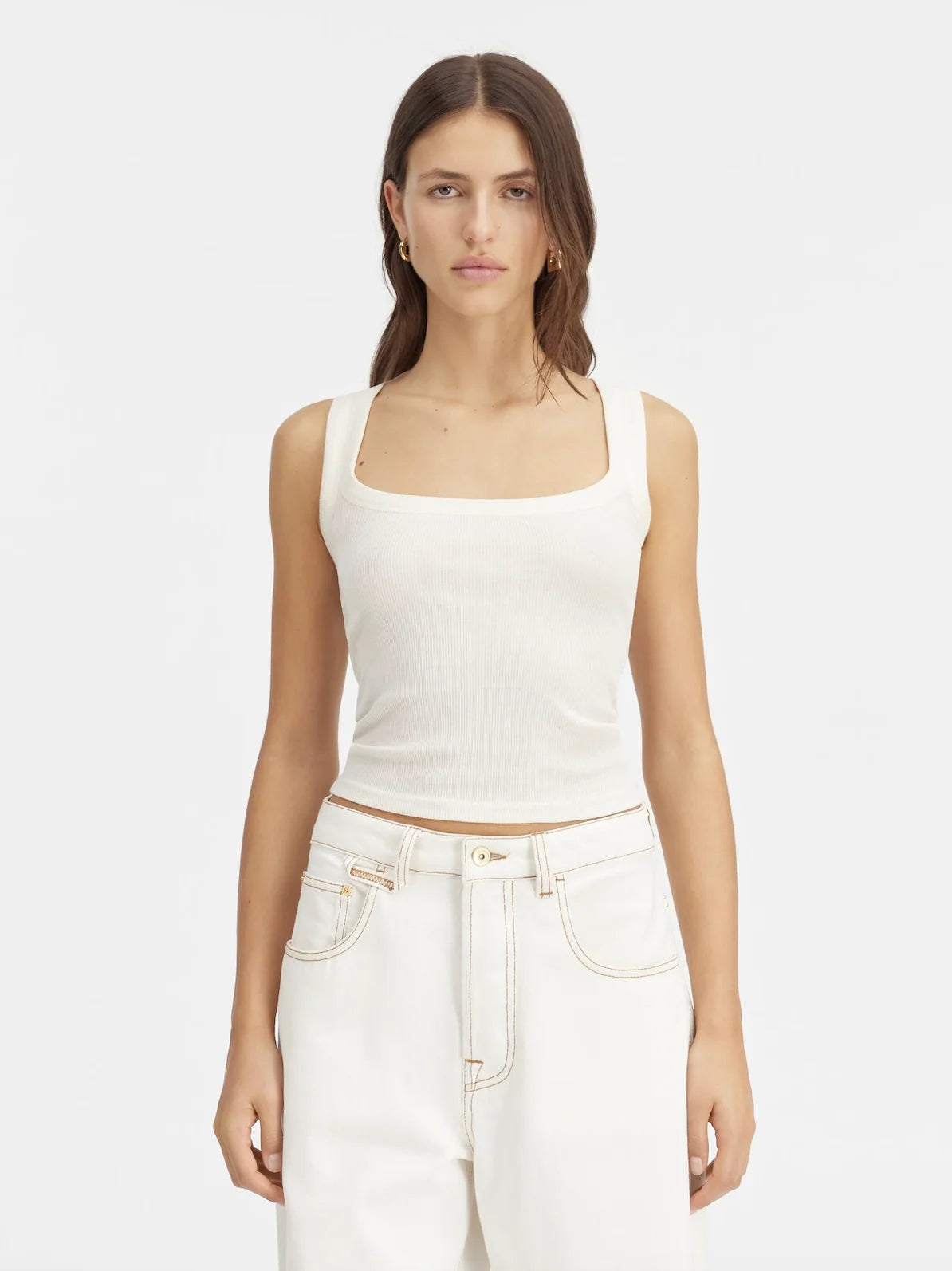 white Crafted from soft ribbed cotton jersey, this fitted tank top is defined by a second skin silhouette and a minimalist design, finished with the signature grosgrain logo detail at the back.

100% ribbed cotton jersey construction

Fitted, second skin silhouette

Square neckline

Ribbed neckline and armholes

Embroidered grosgrain logo at the back