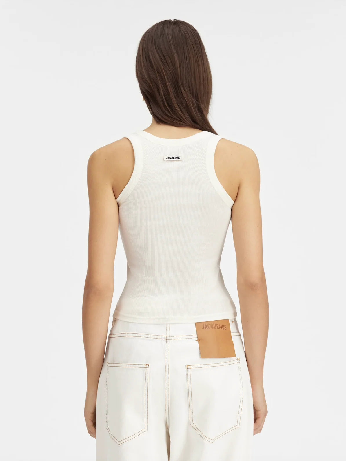 white Crafted from soft ribbed cotton jersey, this fitted tank top is defined by a second skin silhouette and a minimalist design, finished with the signature grosgrain logo detail at the back.

100% ribbed cotton jersey construction

Fitted, second skin silhouette

Square neckline

Ribbed neckline and armholes

Embroidered grosgrain logo at the back