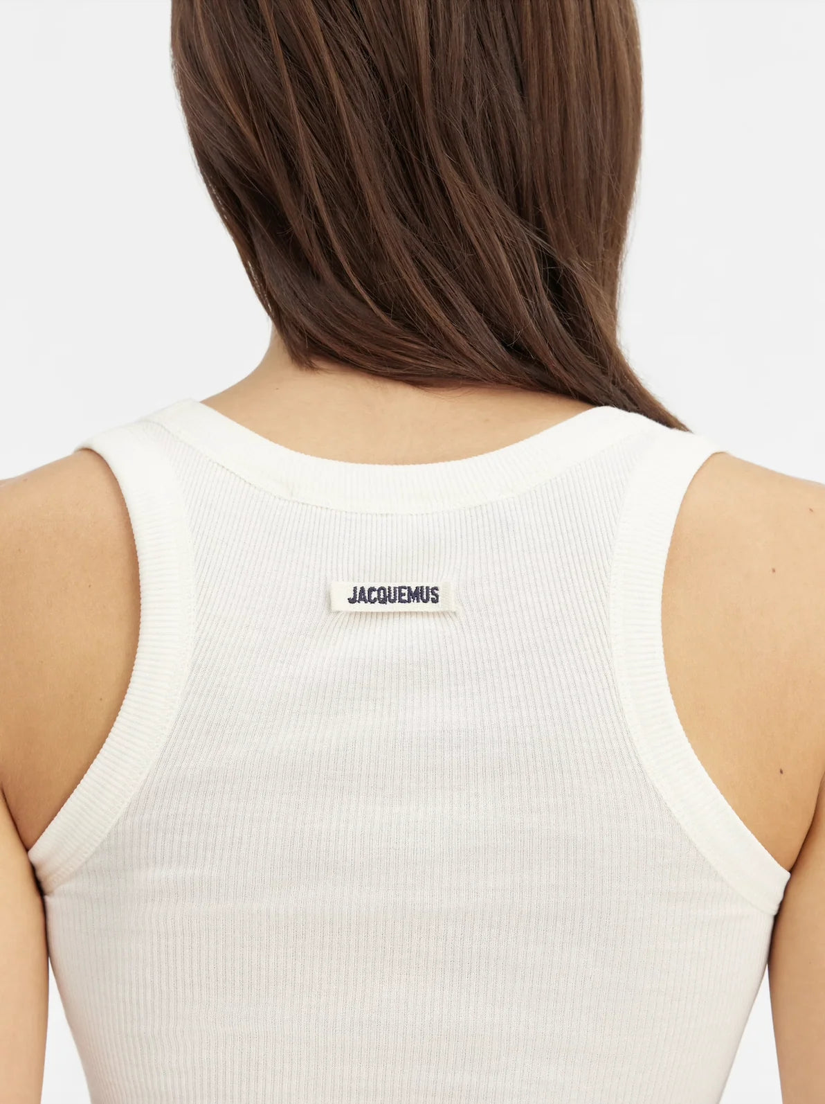 white Crafted from soft ribbed cotton jersey, this fitted tank top is defined by a second skin silhouette and a minimalist design, finished with the signature grosgrain logo detail at the back.

100% ribbed cotton jersey construction

Fitted, second skin silhouette

Square neckline

Ribbed neckline and armholes

Embroidered grosgrain logo at the back