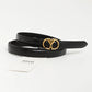 Black belt with gold buckle on a white background