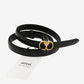 Black belt with gold heart-shaped buckle on a white background, featuring the 'ami' brand.