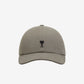 Gray cap with a black logo on a beige background ami paris