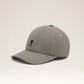Gray cap with a black logo on a beige background ami paris