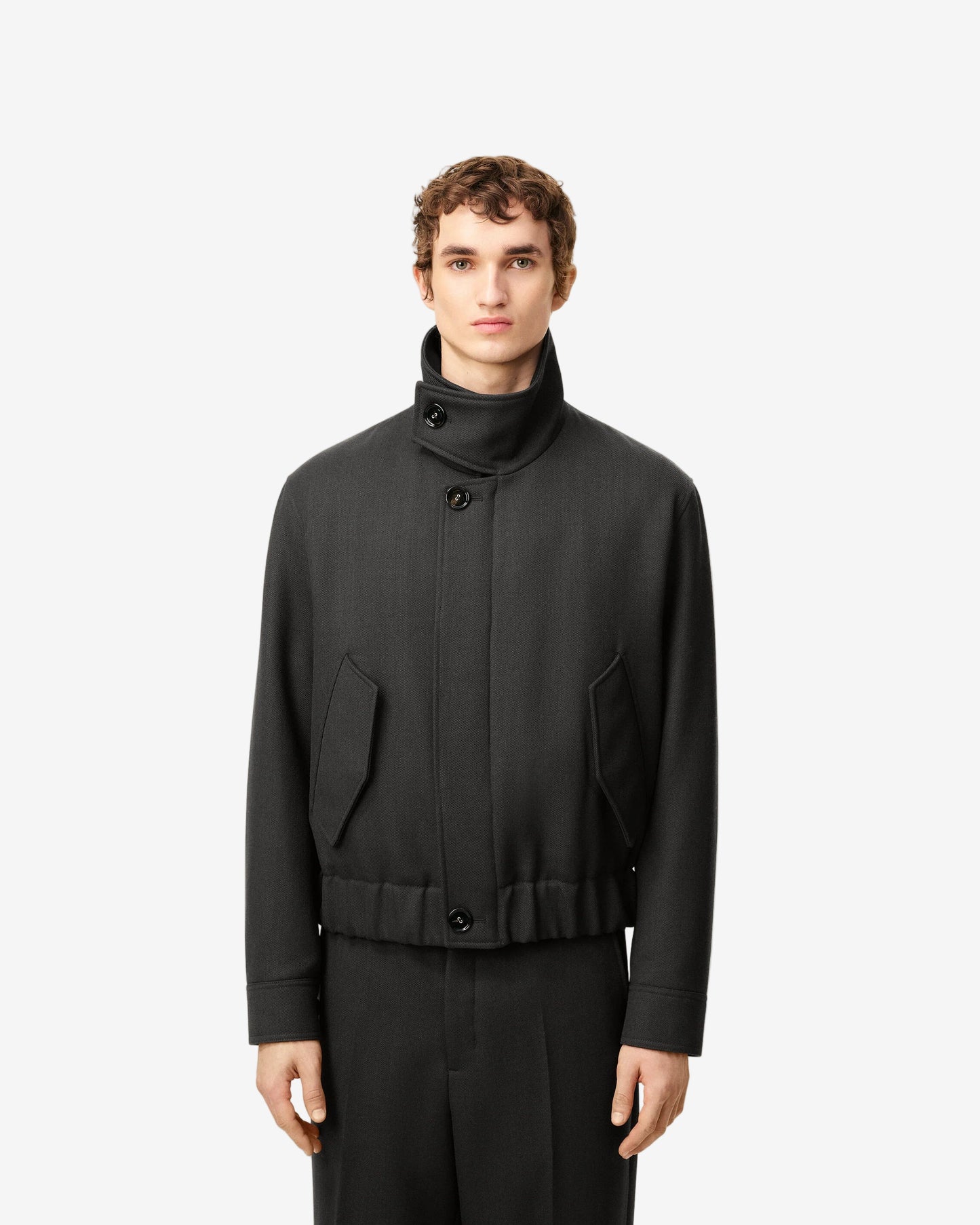 Black jacket on a beige background