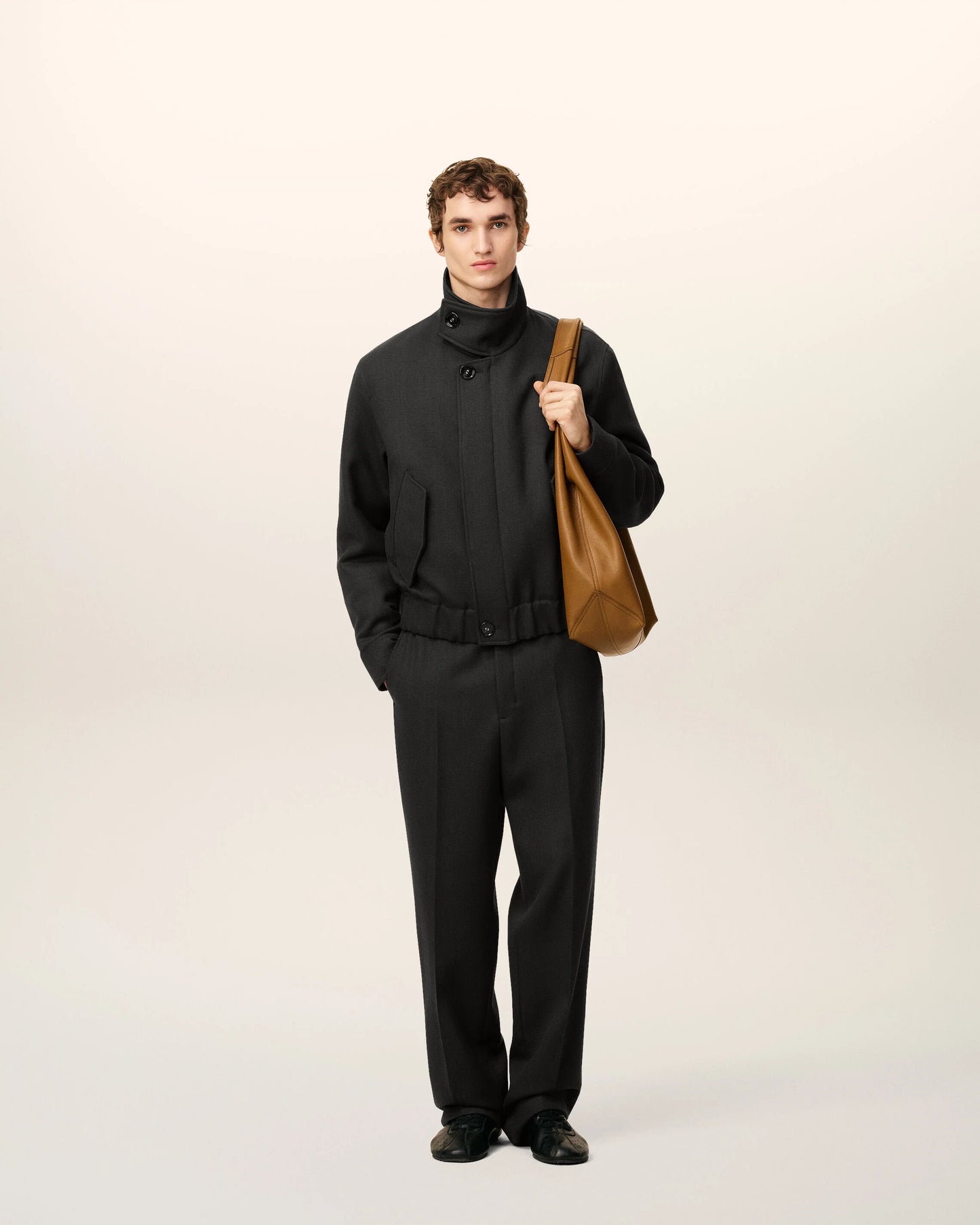 Black jacket on a beige background