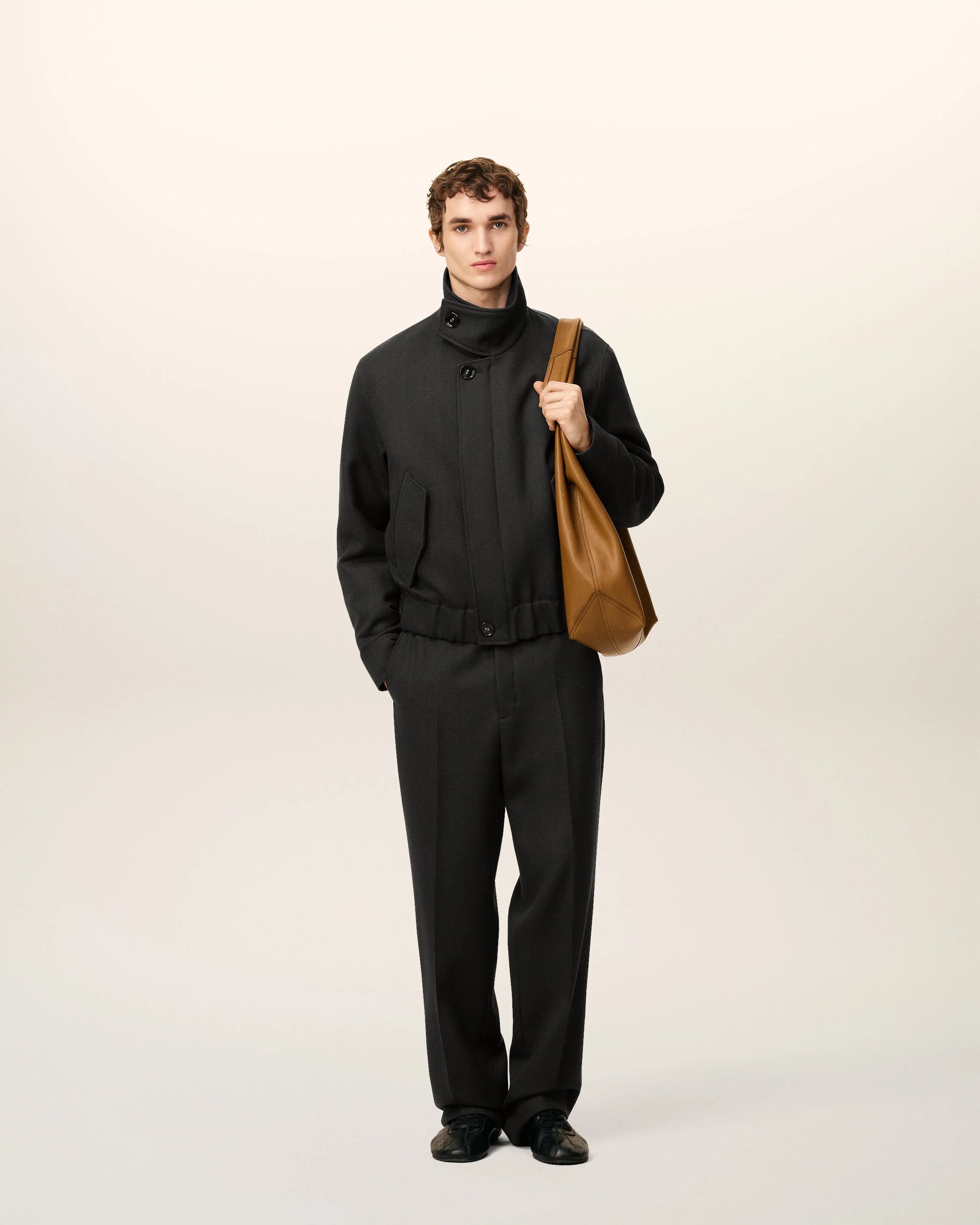 Black jacket on a beige background