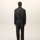 Black jacket on a beige background