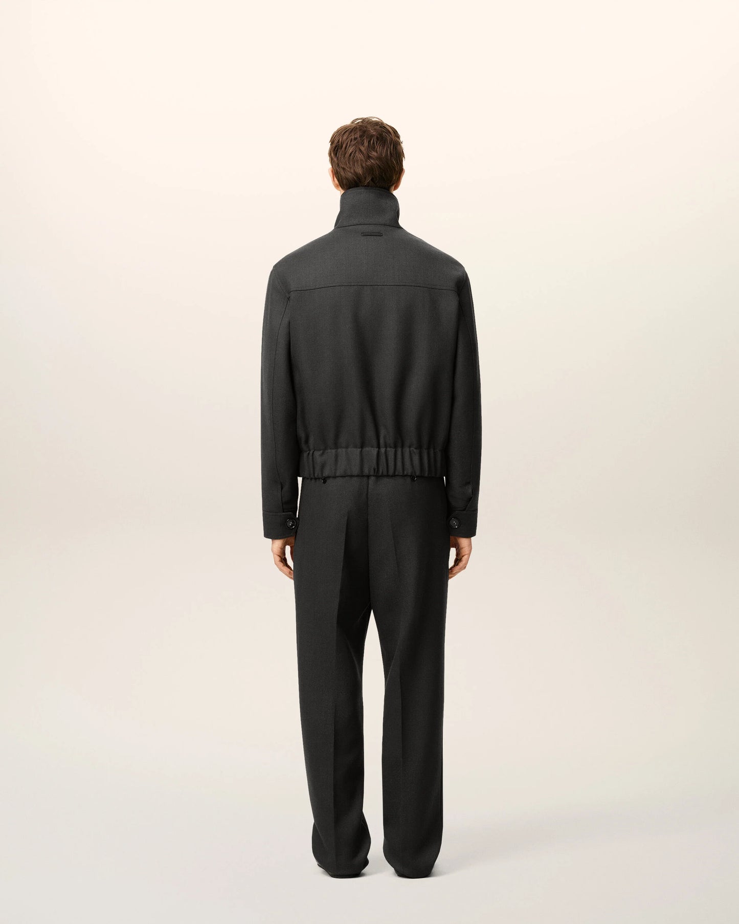 Black jacket on a beige background