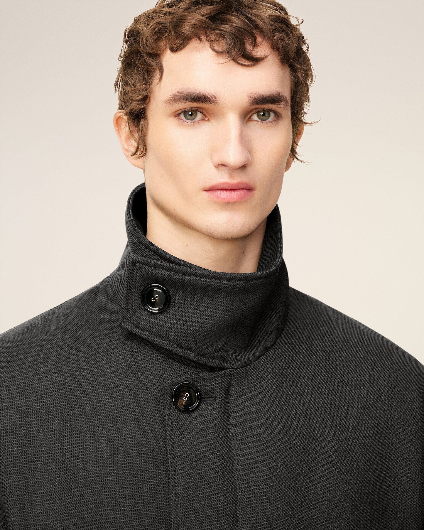 Black jacket on a beige background