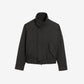 Black jacket on a beige background