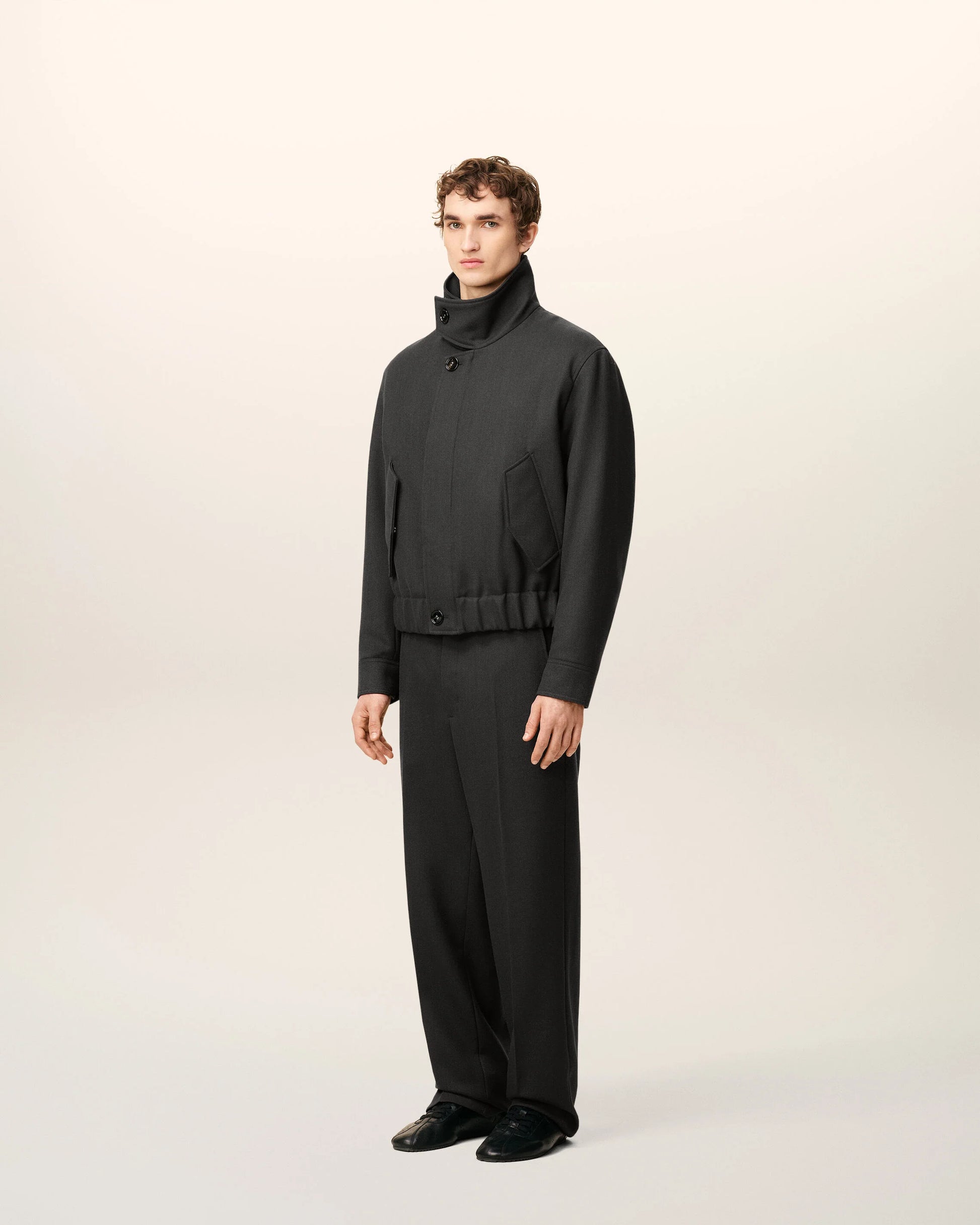 Black jacket on a beige background
