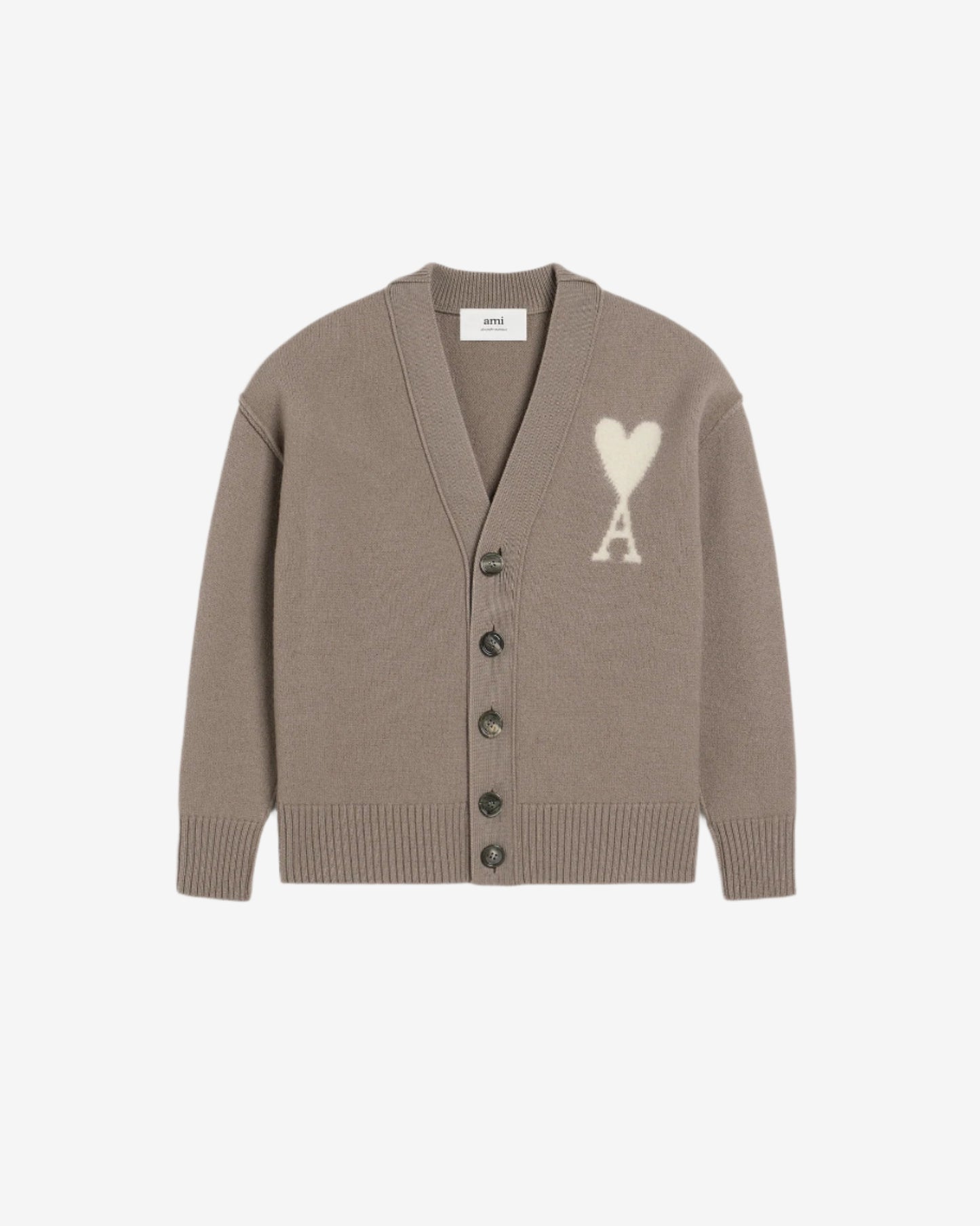 Brown cardigan with a heart and 'AMI' logo on a beige background