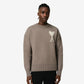 Brown sweater with a logo on a beige background