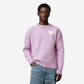 Lavender sweater with a heart design on a light beige background