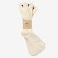 Pair of cream socks with a visible brand label on a light gray background