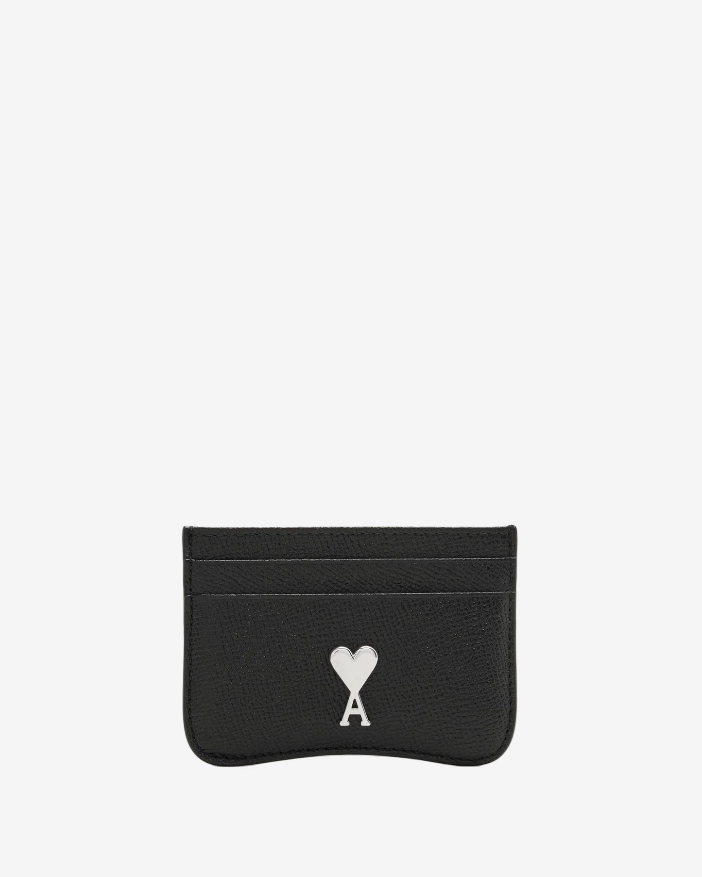 Black cardholder with a white logo on a beige background