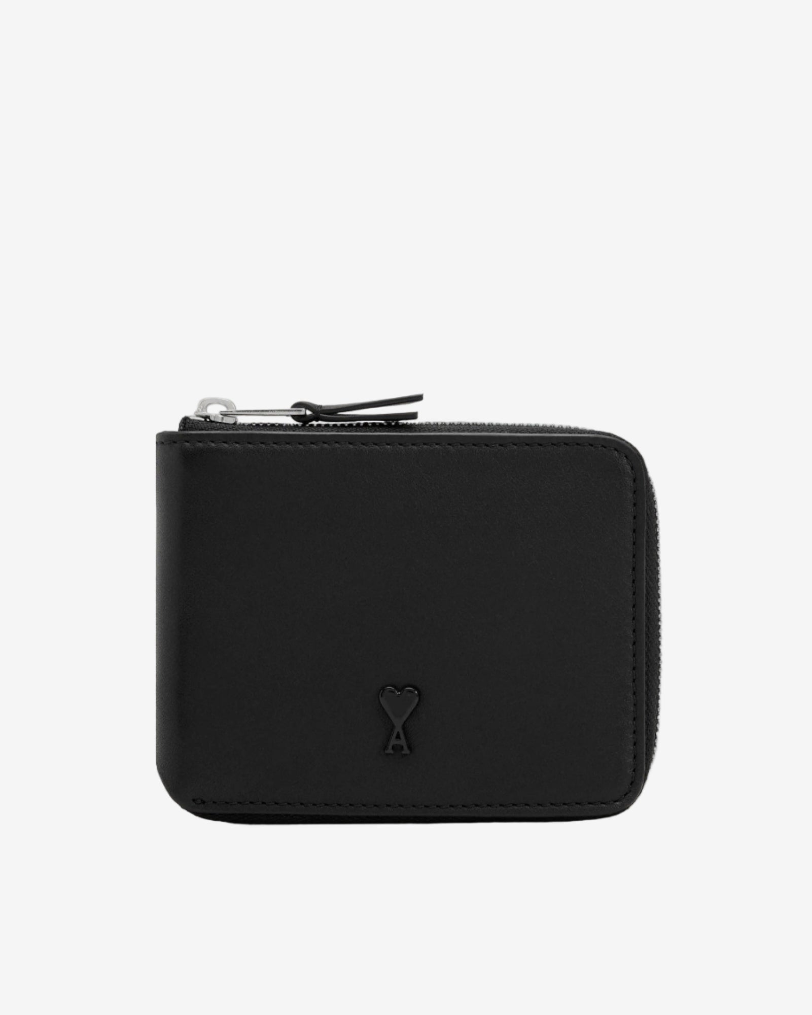 Black wallet on a beige background