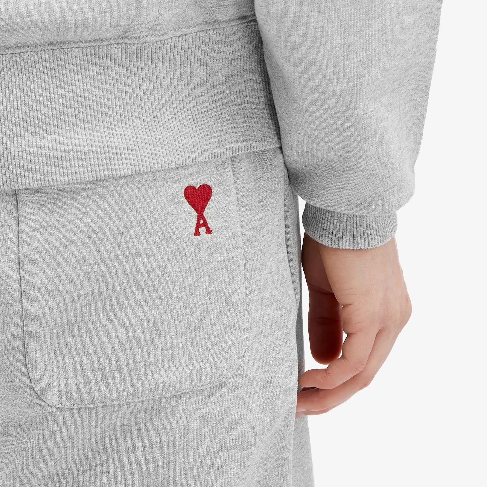 Gray shorts with a drawstring on a white background