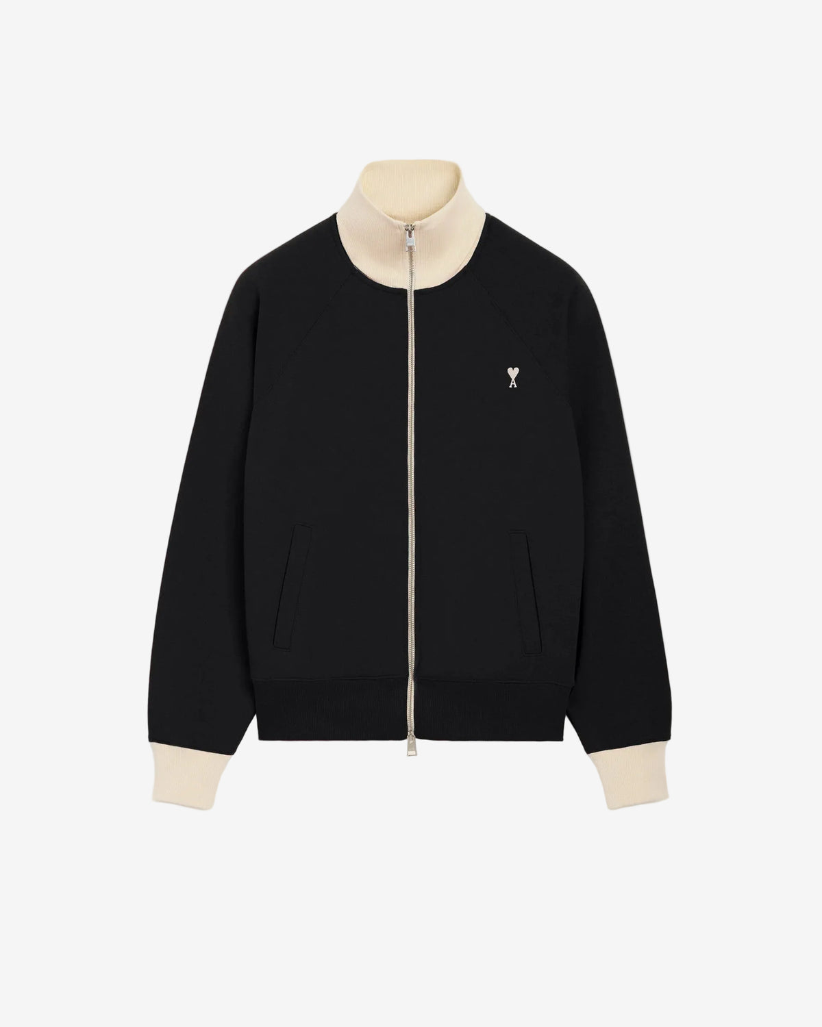 A black zip-up jacket with cream ribbed collar, cuffs, and hem, featuring a small embroidered logo on the left chest, displayed on a mannequin against a light beige background.