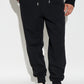 Black sweatpants on a white background