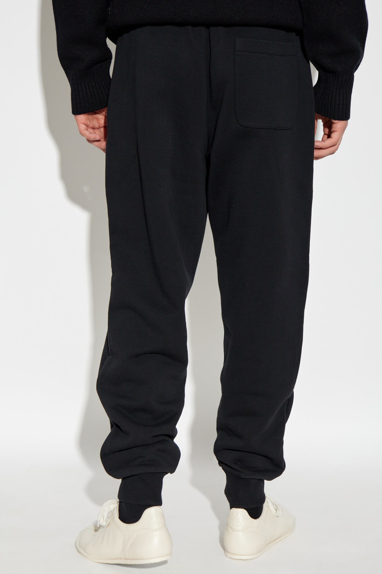 Black sweatpants on a white background
