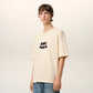 Beige t-shirt with 'AM! PARIS' text on a light gray background